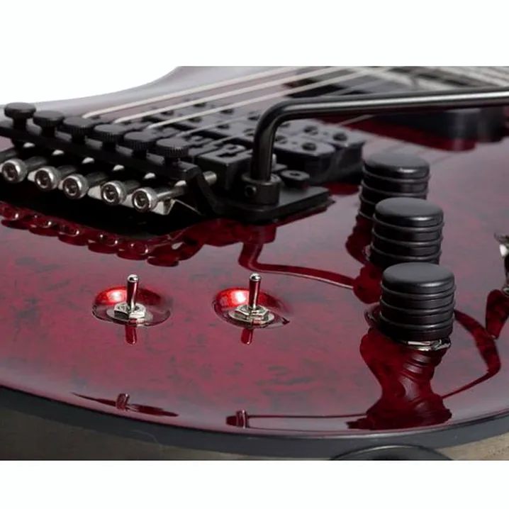 La chitarra elettrica Schecter C-1 FR S Apocalypse Red Reign Recensione, Test & Confronto